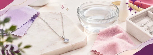 sterling necklaces and a bowl of water with soft cloth 