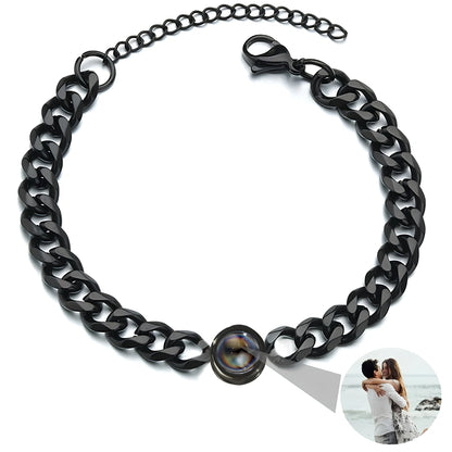 Black chain collar with a button clasp on a white background with a photo projection feature