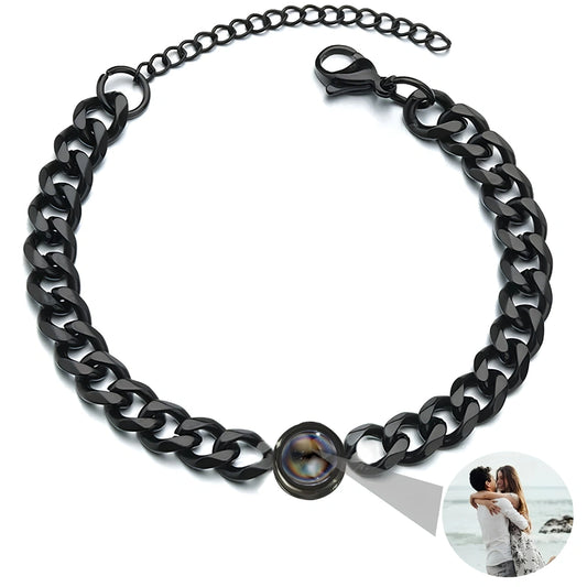 Black chain collar with a button clasp on a white background with a photo projection feature