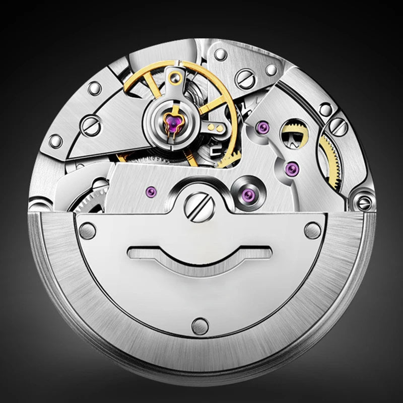 Close-up of a mechanical watch movement on a dark background