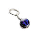 Keychain with a purple and blue design on a white background