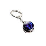 Keychain with a purple and blue design on a white background