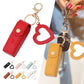 Red and yellow keychain cases with heart-shaped keychains on a white background