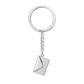 Silver keychain with a geometric pendant on a white background