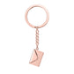 Rose gold keychain with a geometric pendant on a white background
