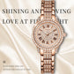 Rose gold watch with diamond accents on a beige satin background